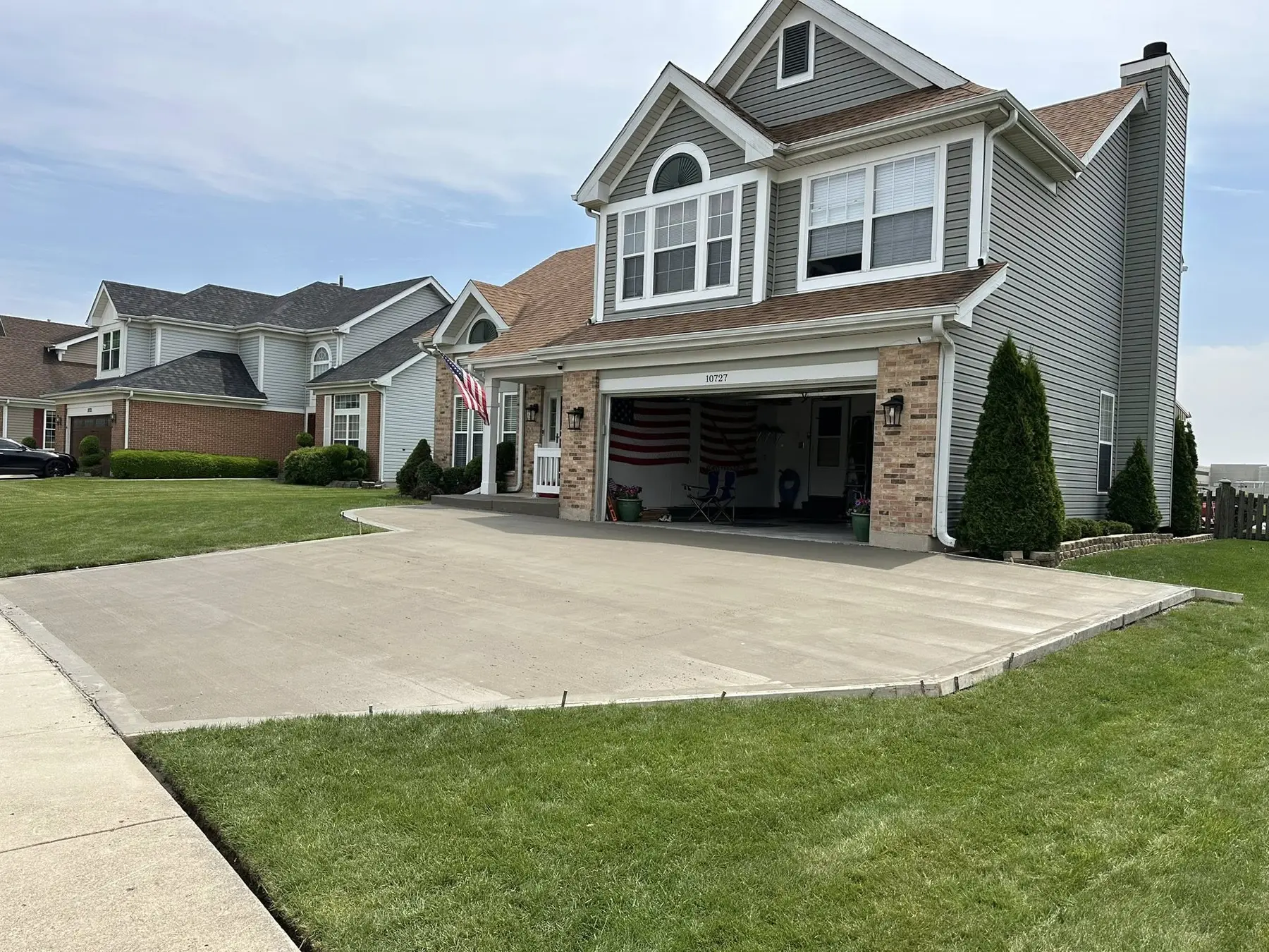 Palacios Concrete residential driveway project Finished residential concrete driveway by Palacios Concrete in Southeast Wisconsin